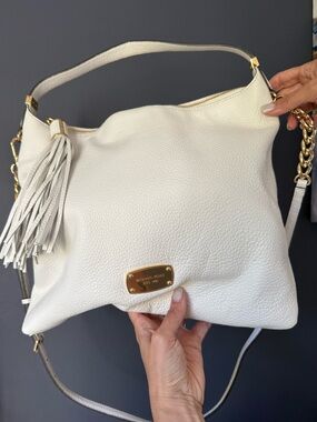 Michael Kors Cream Pebbled Leather Shoulder Tote w/ Tassel. Excellent condition